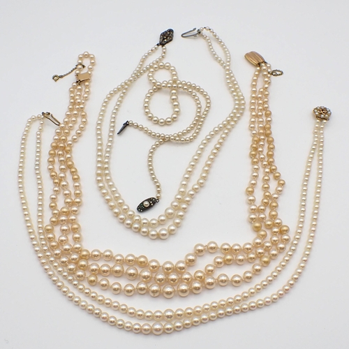 190 - Two double rows of graduated Cultured Pearls one on 9ct gold clasp, a triple row of Ciro graduated f... 