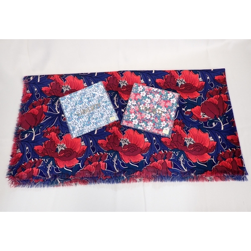 205 - A Liberty style Scarf printed red poppies on blue ground, 4ft 6in square and two Liberty cotton Hand... 