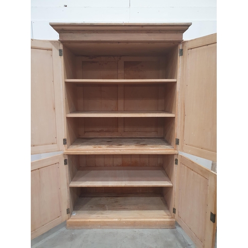 1 - An antique pine Housekeeper's Cupboard fitted four panel doors 7ft 2in H x 4ft 4in W (FW)