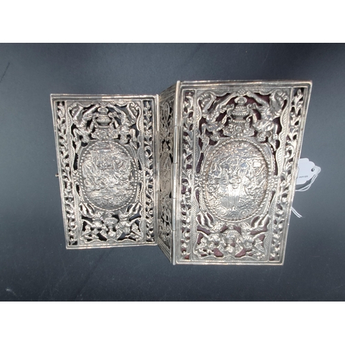 103 - A Continental silver Book Cover pierced and embossed numerous figures, oval cartouches of further fi... 