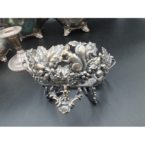 108 - A Victorian plated three piece Tea Service floral embossed, a Dish Holder embossed squirrels and fru... 