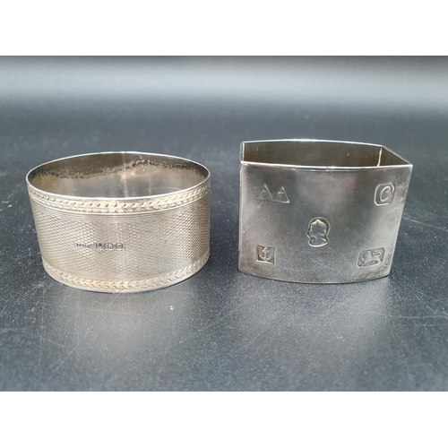 116 - A Queen Elizabeth heavy silver Napkin Ring, London 1977, and another, London 1946