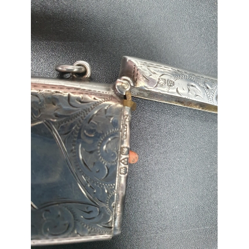 120 - A George V silver Vesta Case with leafage scroll engraving and vacant cartouche, Chester, 1920