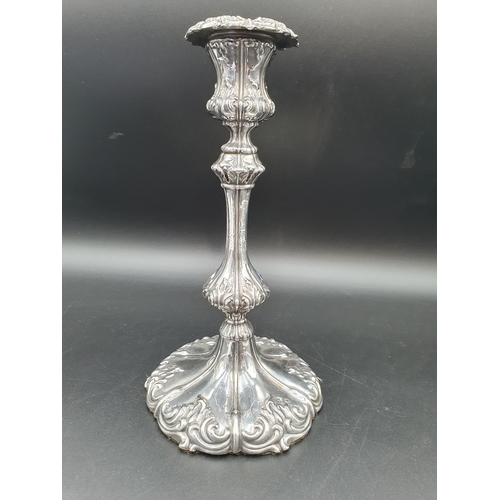 139 - A George III silver Candlestick with knopped stem on leafage scroll decorated shaped circular base, ... 