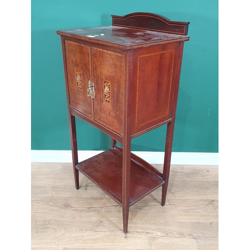 14 - An Edwardian mahogany and inlaid two door Cabinet 3ft 6in H x 1ft 9in W (R4)