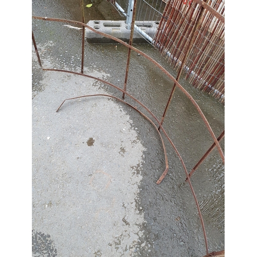 228 - A wrought iron Pergola, 9ft H