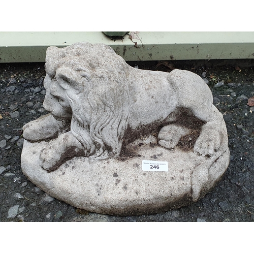 246 - A small reconstituted Garden Figure of a lion, 12in L