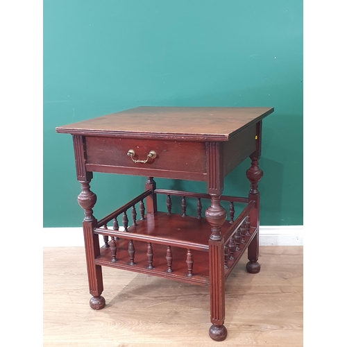 255 - A mahogany two tier Occasional Table with single fitted drawer on turned and fluted supports with sp... 