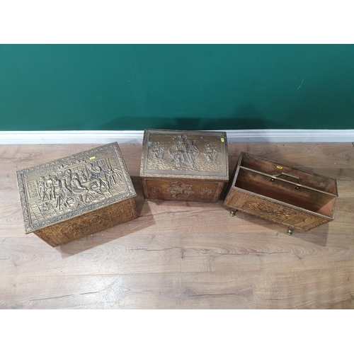 270 - Two brass embossed Coal Boxes with figure and ship designs and an embossed Magazine Rack. (R8).