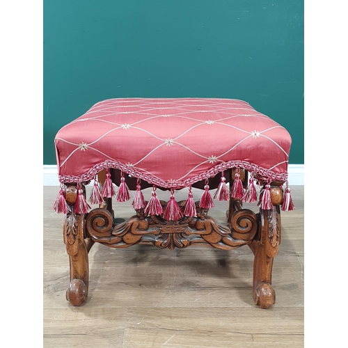 273 - A red upholstered Footstool on leafage carved scroll supports 1ft 9in W x 1ft 6in H (R10)