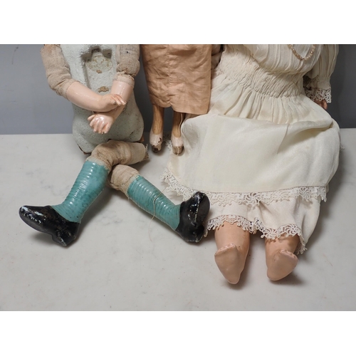 285 - Three Vintage unnamed Dolls. (R9).