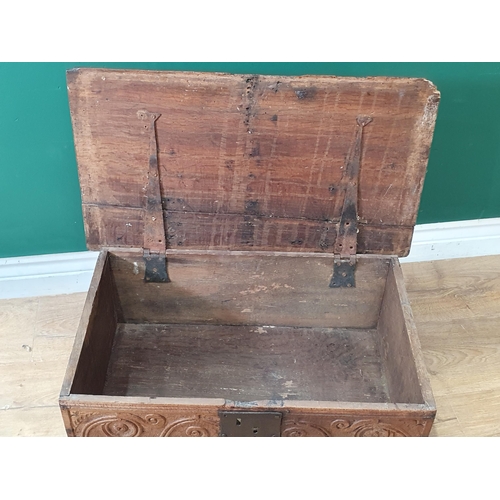 3 - A 17th Century oak Book Box with scroll carved front and later blacksmith hinges (lid split A/F) 2ft... 