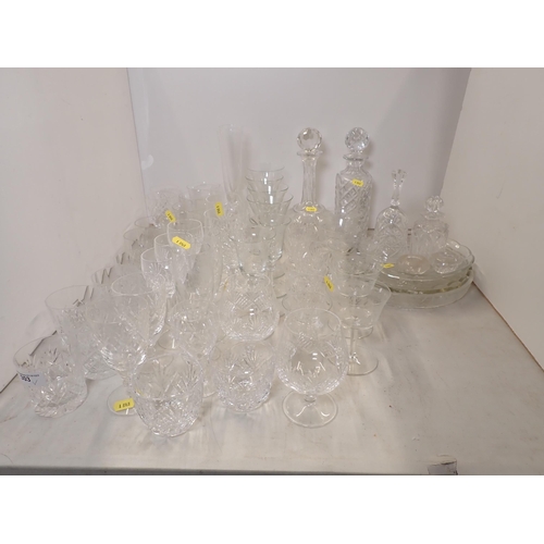 303 - A collection of mainly cut glass including two Decanters, Scent Bottle and stopper, Drinking Glasses... 