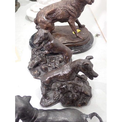 338 - A group of Spelter Figures including a Ram's Head, Dogs and resin Figures of a bird in flight, Dog a... 