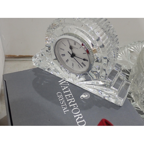 353 - An Edinburgh Crystal Rose Bowl, boxed, a Waterford Crystal Mantel Clock, glass Bowls, Candlesticks e... 