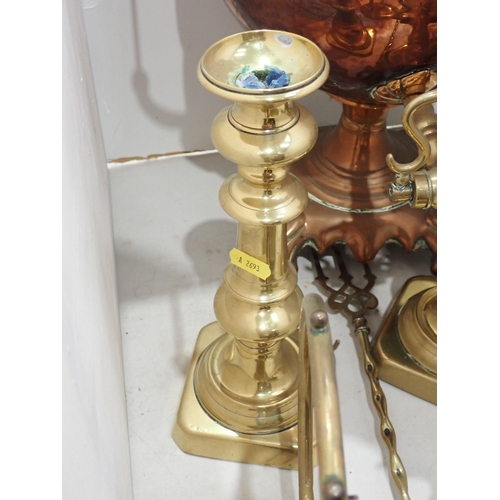 358 - A copper two handled Tea Urn with brass tap 18in H, handles A/F, a pair of brass Candlesticks, Toast... 