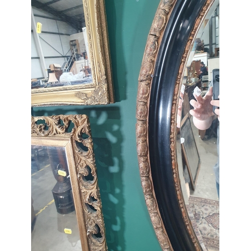 387 - Five oval Wall Mirrors and a brss framed Wall Mirror (R11)