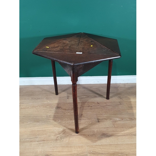 400 - An 18th Century oak triangular dropleaf Occasional Table on turned supports, 2ft 2