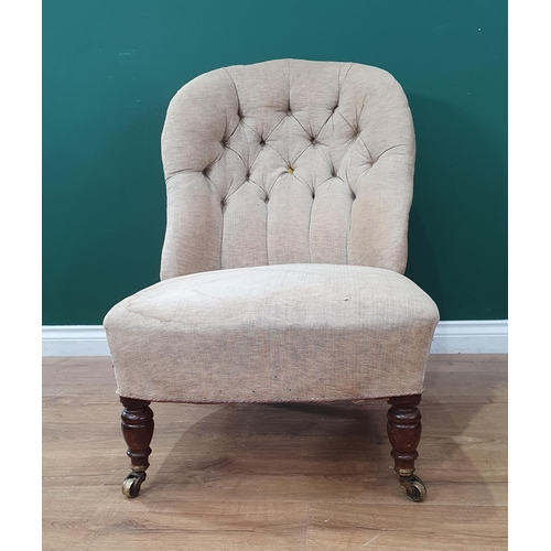 44 - A Victorian grey upholstered Nursing Chair on turned mahogany front supports 2ft 8in H x 1ft 10in W ... 