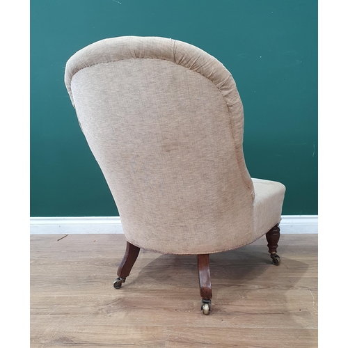 44 - A Victorian grey upholstered Nursing Chair on turned mahogany front supports 2ft 8in H x 1ft 10in W ... 