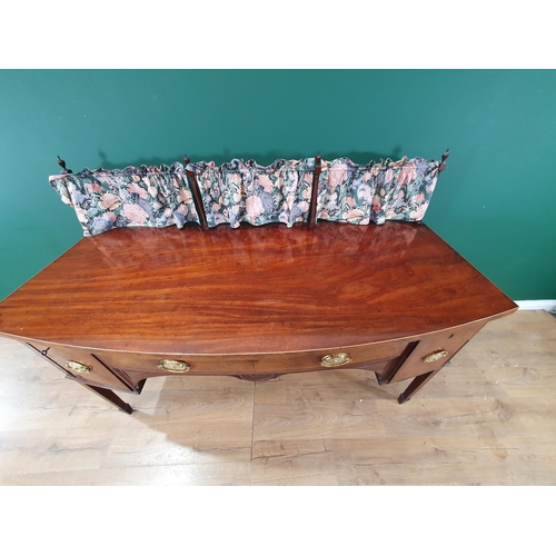 472 - A 19th Century mahogany bow fronted Sideboard with raised turned gallery rail above cupboard door an... 