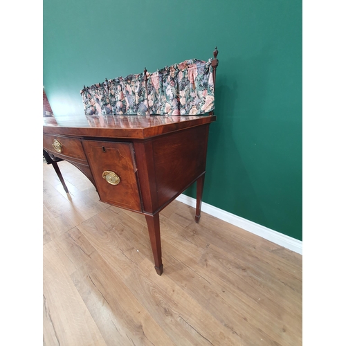 472 - A 19th Century mahogany bow fronted Sideboard with raised turned gallery rail above cupboard door an... 