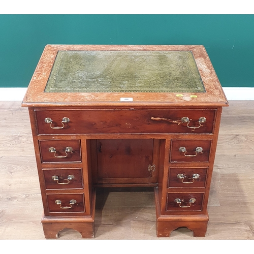 490 - A reproduction yew wood veneered Kneehole Desk fitted seven drawers A/F 2ft 6in W x 2ft 6in H (R4)