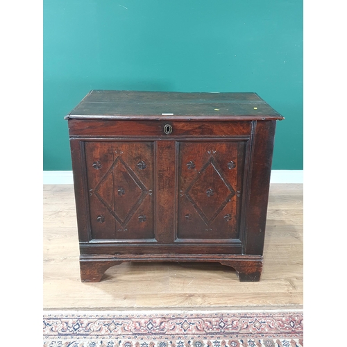 491 - A 17th Century oak Chest with hinged lid above diamond carved panel front on later bracket feet (som... 