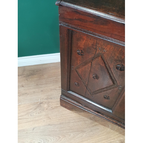 491 - A 17th Century oak Chest with hinged lid above diamond carved panel front on later bracket feet (som... 