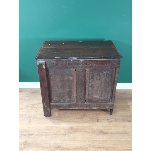 491 - A 17th Century oak Chest with hinged lid above diamond carved panel front on later bracket feet (som... 