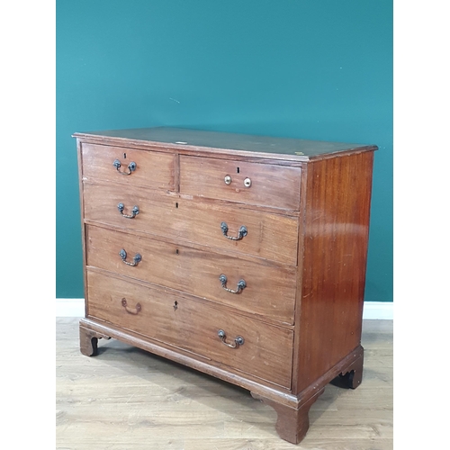 492 - A 19th Century mahogany Chest of two short and three long graduated drawers mounted on bracket feet ... 