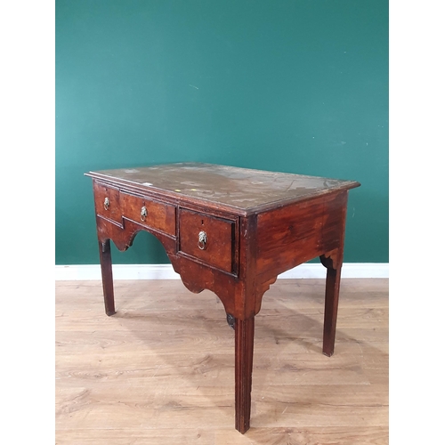 493 - An antique oak and burr oak veneered Side Table fitted three drawers above shaped apron raised on al... 