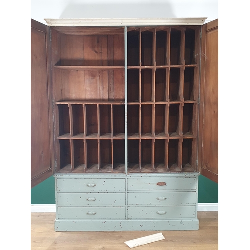 500 - A 19th Century grey painted Set of Pigeon Holes enclosed by two cupboard doors above base fitted six... 