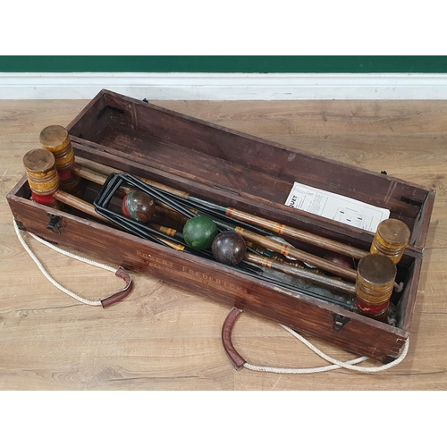 502 - A Croquet Set in stained wooden case (R3)