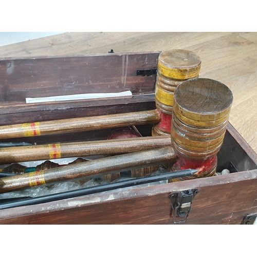 502 - A Croquet Set in stained wooden case (R3)