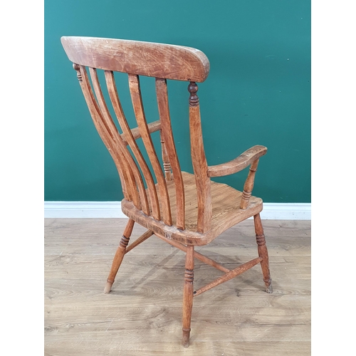 503 - An antique ash lathe back Kitchen Armchair 3ft 6in H x 1ft 10in W (R3)