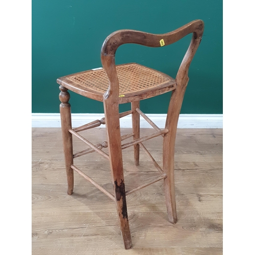 504 - A cane seated High Chair (R3)