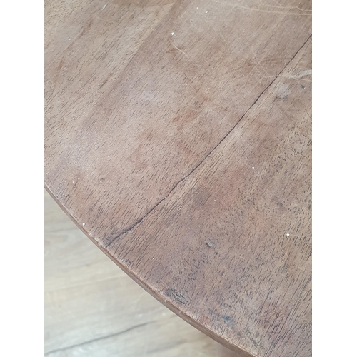 506 - An antique mahogany Cricket Table on turned supports and pad feet 2ft 1in H x 1ft 11in D (R4)