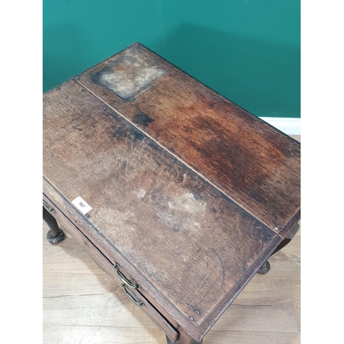 507 - An 18th Century oak Lowboy with moulded two plank top above two long drawers with shaped apron mount... 