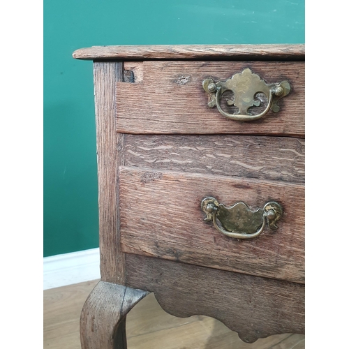 507 - An 18th Century oak Lowboy with moulded two plank top above two long drawers with shaped apron mount... 