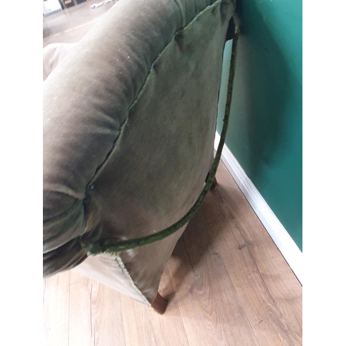 512 - An antique green upholstered Armchair on carved paw feet 2ft 6in H x 2ft 4in W (R4)