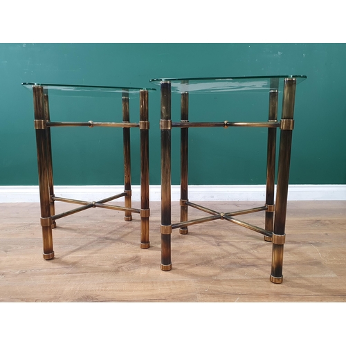 525 - A pair of glass topped Occasional Tables on brass bases 1ft 11in H x 1ft 5in W (R3)