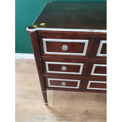 534 - A modern mahogany veneered Chest of three long drawers on tuned supports 4ft 6in W x 3ft H (R6)