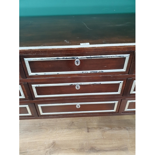 534 - A modern mahogany veneered Chest of three long drawers on tuned supports 4ft 6in W x 3ft H (R6)