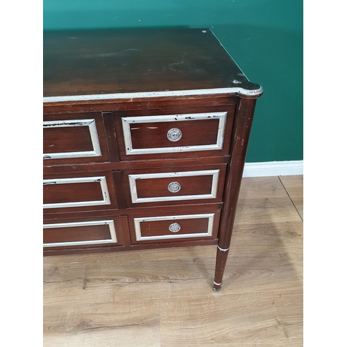 534 - A modern mahogany veneered Chest of three long drawers on tuned supports 4ft 6in W x 3ft H (R6)