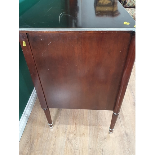 534 - A modern mahogany veneered Chest of three long drawers on tuned supports 4ft 6in W x 3ft H (R6)