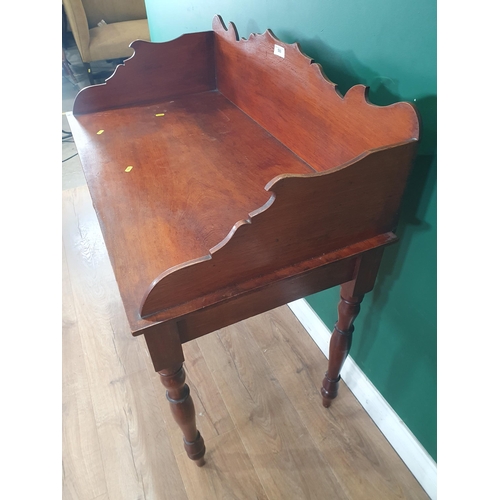 560 - An antique mahogany Washstand with raised gallery back fitted single frieze drawer raised on turned ... 