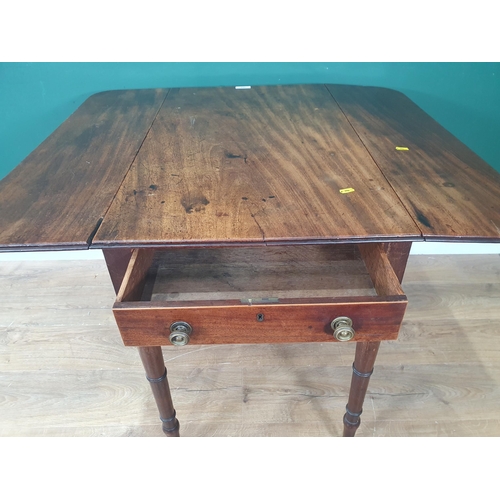 568 - A 19th Century mahogany Pembroke Table fitted end drawer and dummy drawer raised on turned supports ... 