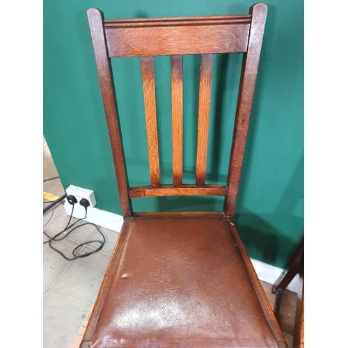 576 - A set of four oak Dining Chairs and a cane Elbow Chair (R6)