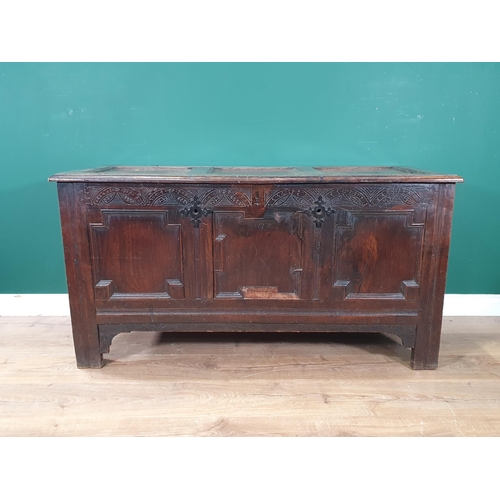 593 - A 17th Century oak Coffer with sunken three panel lid above geometric moulded front 4ft 3in W x 2ft ... 